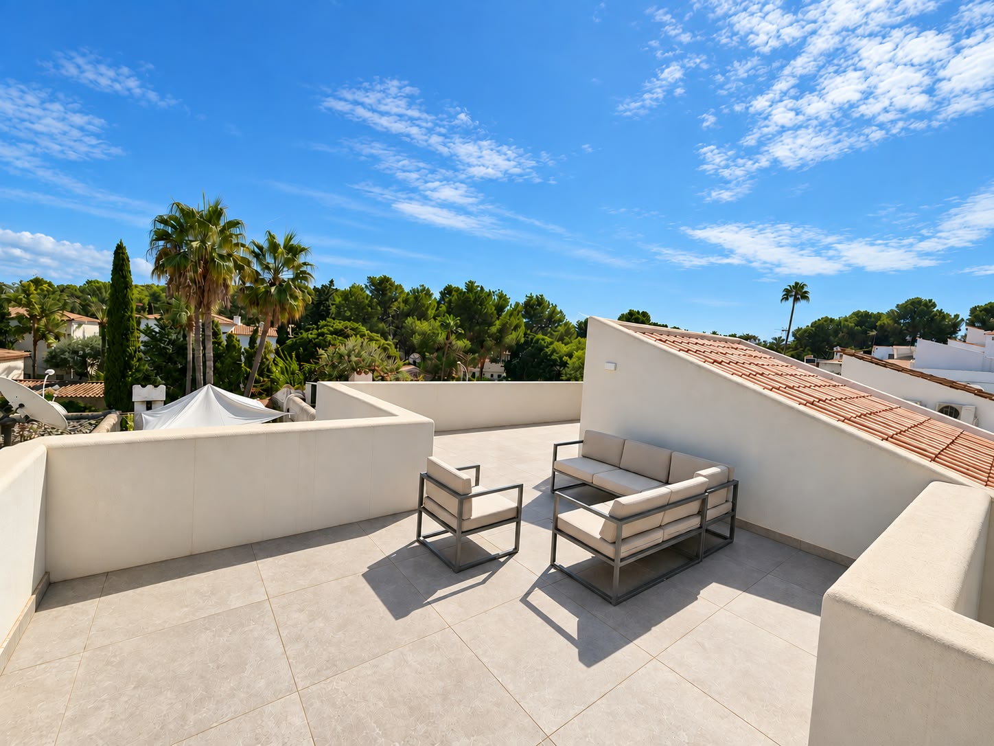 Private rooftop terrace with lounge seating and open views over Bendinat