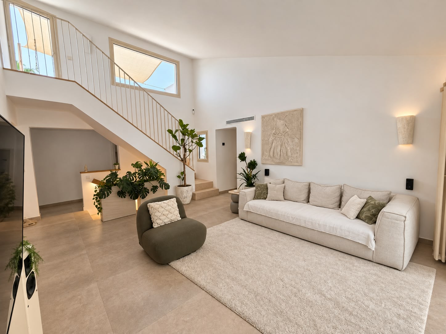 The living room · natural light, from every angle